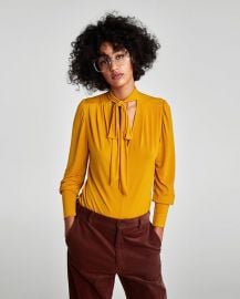 blouse with bow collar ochre at Zara